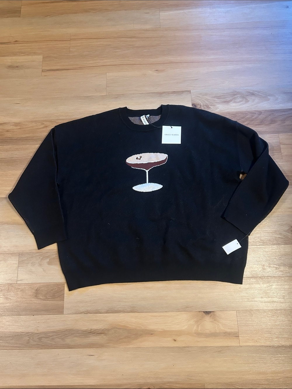 Black Graphic Crewneck Sweater with Champagne Glass Motif - GRACE + KARMA